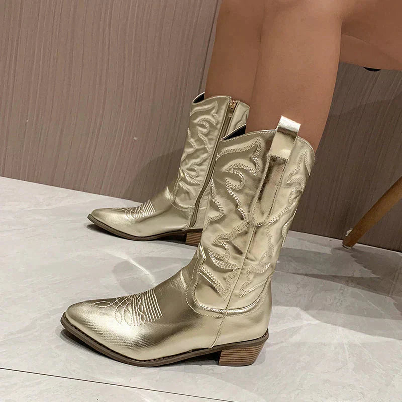 Women's shiny western boots with mirror-like glossy finish, classic rodeo style meets modern twist