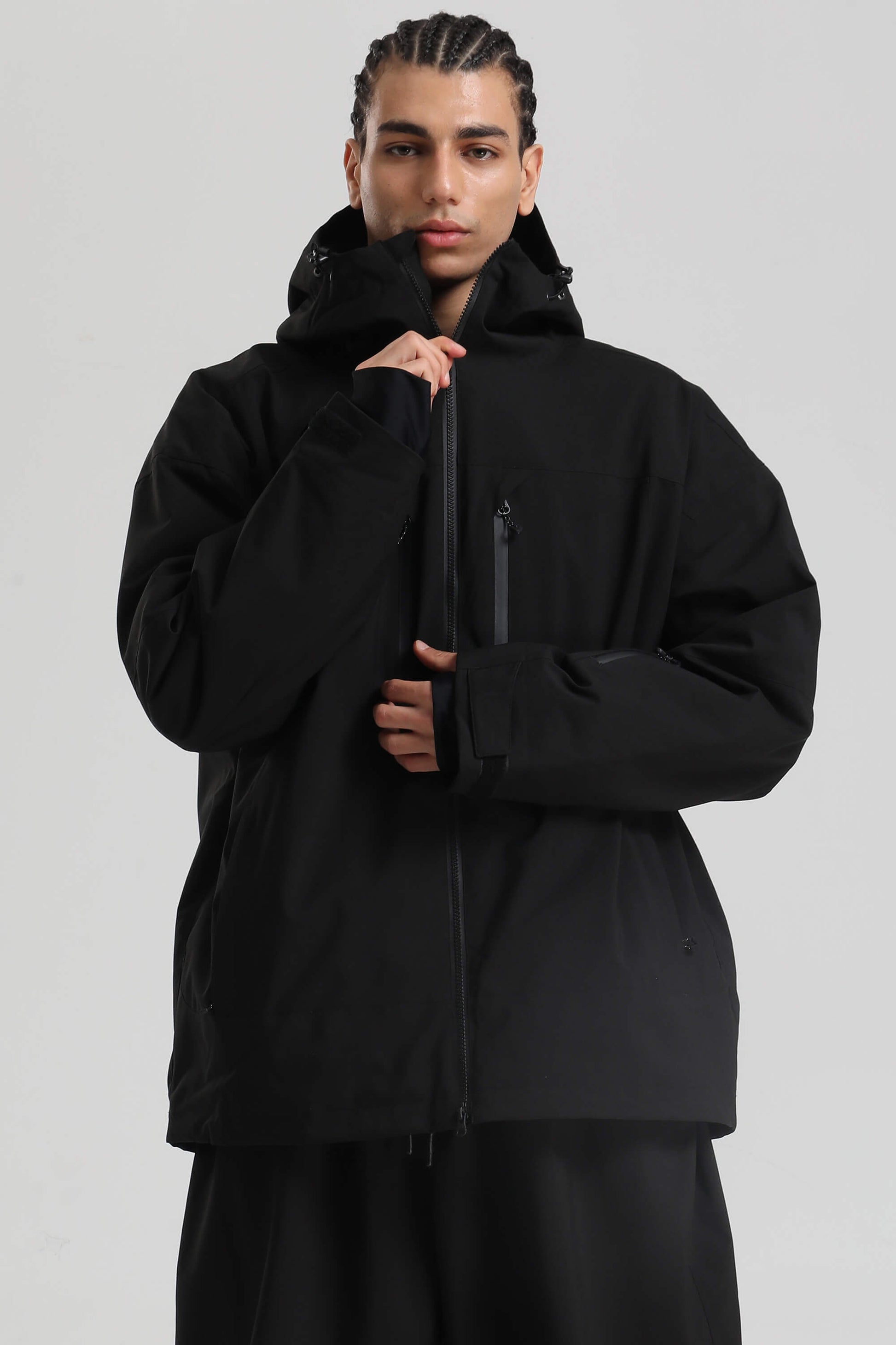 Men's coffee brown oversized insulated snow jacket with multi-pocket waterproof design for winter outdoor adventures