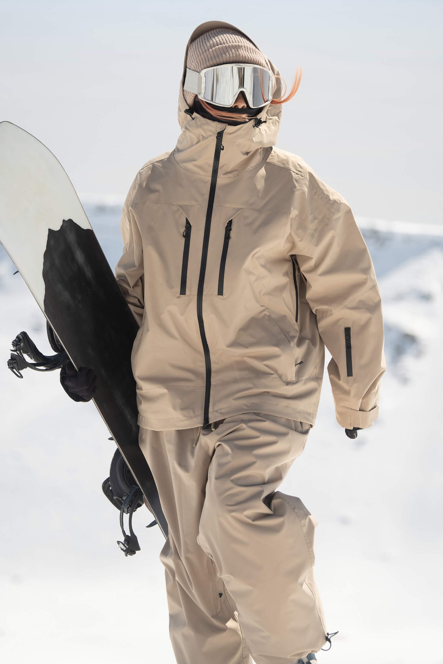 Women's rose insulated waterproof snow jacket oversized cut with dual venting and multi-pocket design