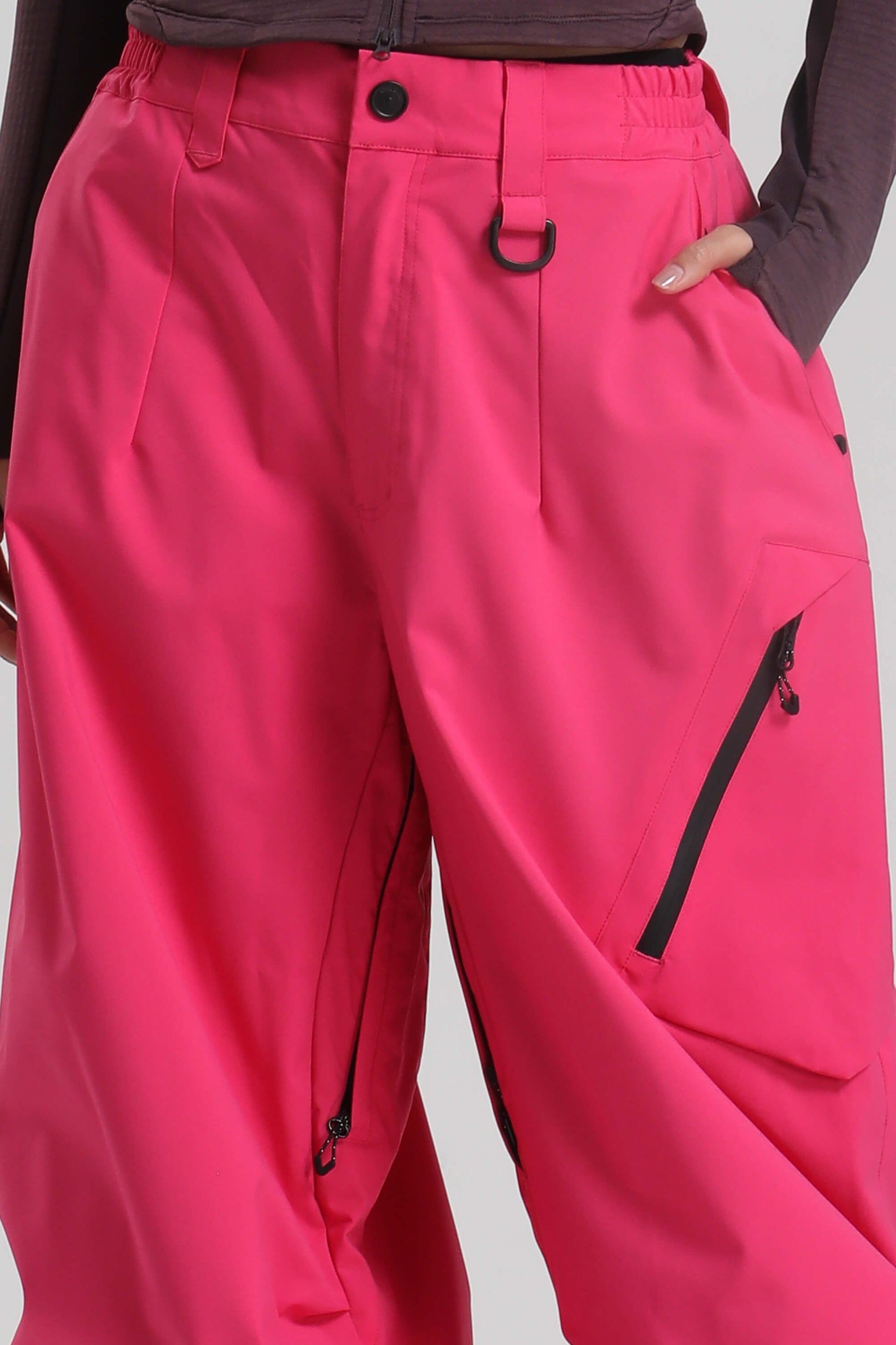 Women's ice blue lightweight baggy snow pants waterproof breathable with inner thigh vents for skiers