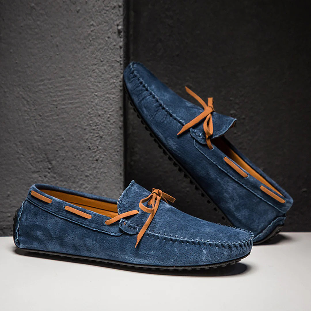 Men's soft suede loafers classic moccasin silhouette with decorative lacing and flexible rubber sole