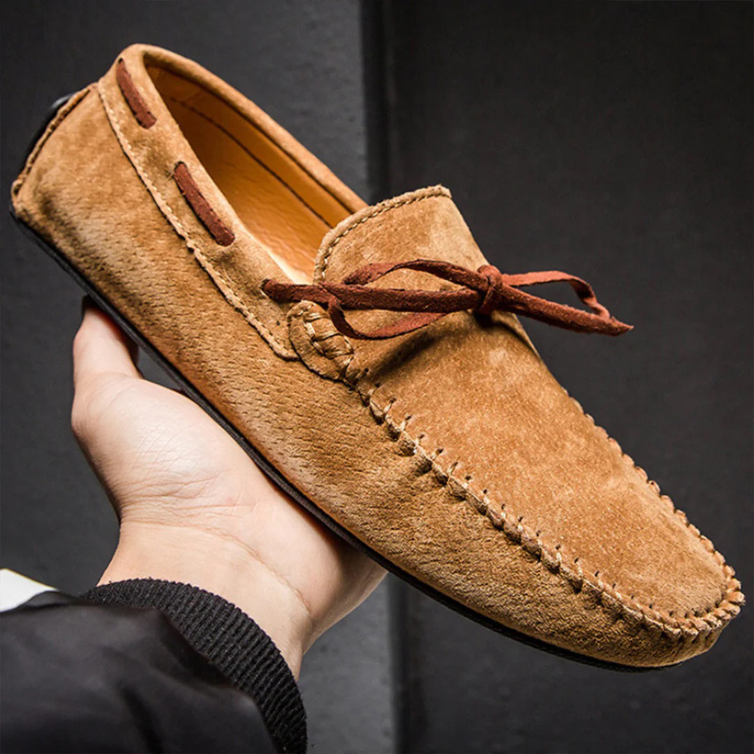 Men's soft suede loafers classic moccasin silhouette with decorative lacing and flexible rubber sole