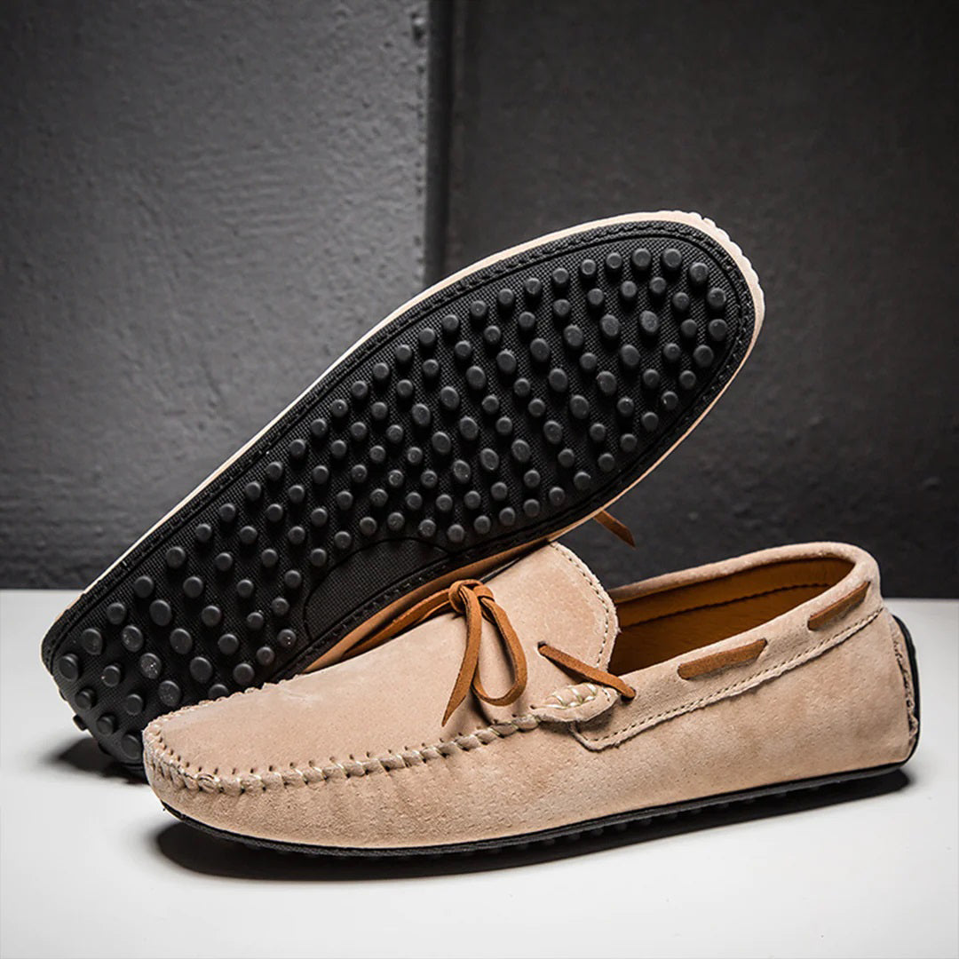 Men's soft suede loafers classic moccasin silhouette with decorative lacing and flexible rubber sole