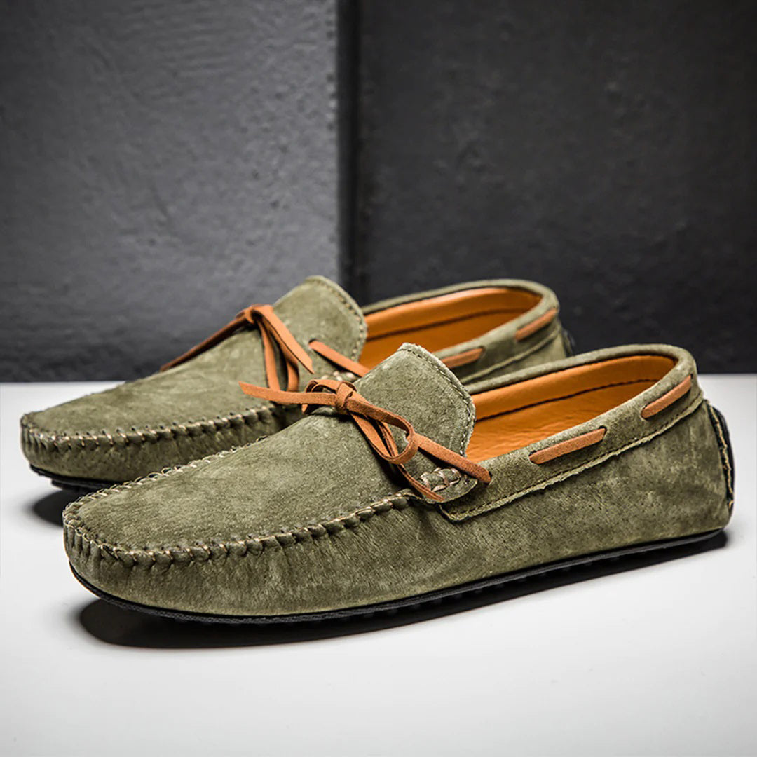 Men's soft suede loafers classic moccasin silhouette with decorative lacing and flexible rubber sole