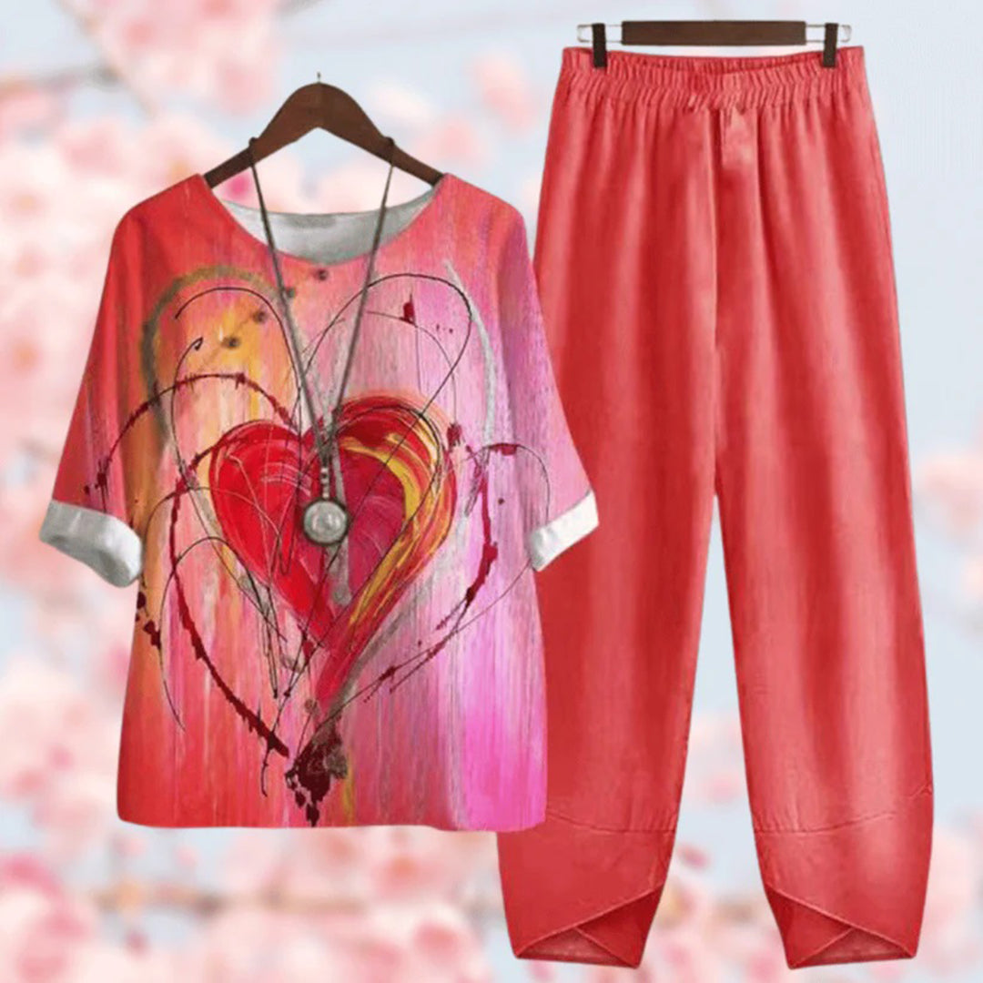 Women's floral button-detail top and wide-leg elastic waist pants set, three-quarter sleeves