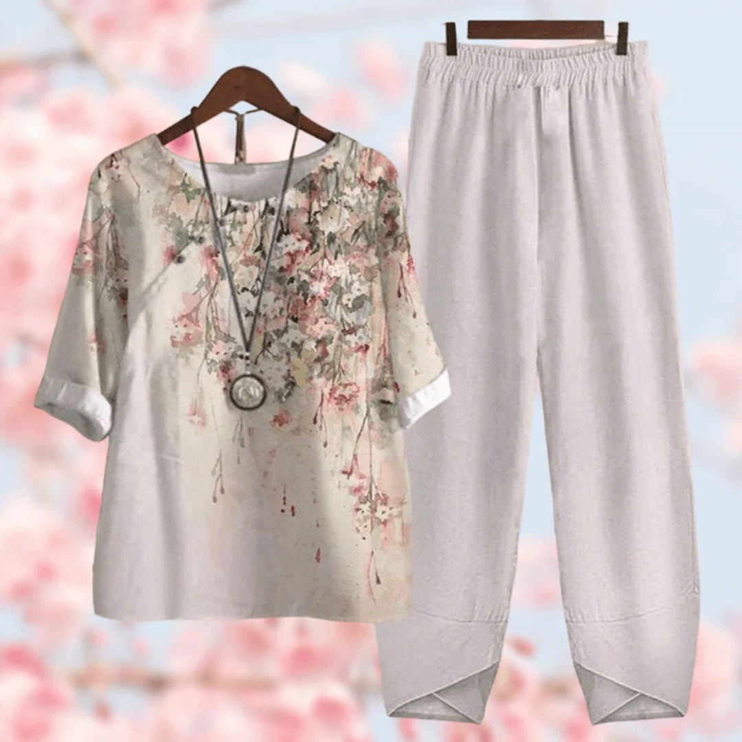 Women's floral button-detail top and wide-leg elastic waist pants set, three-quarter sleeves