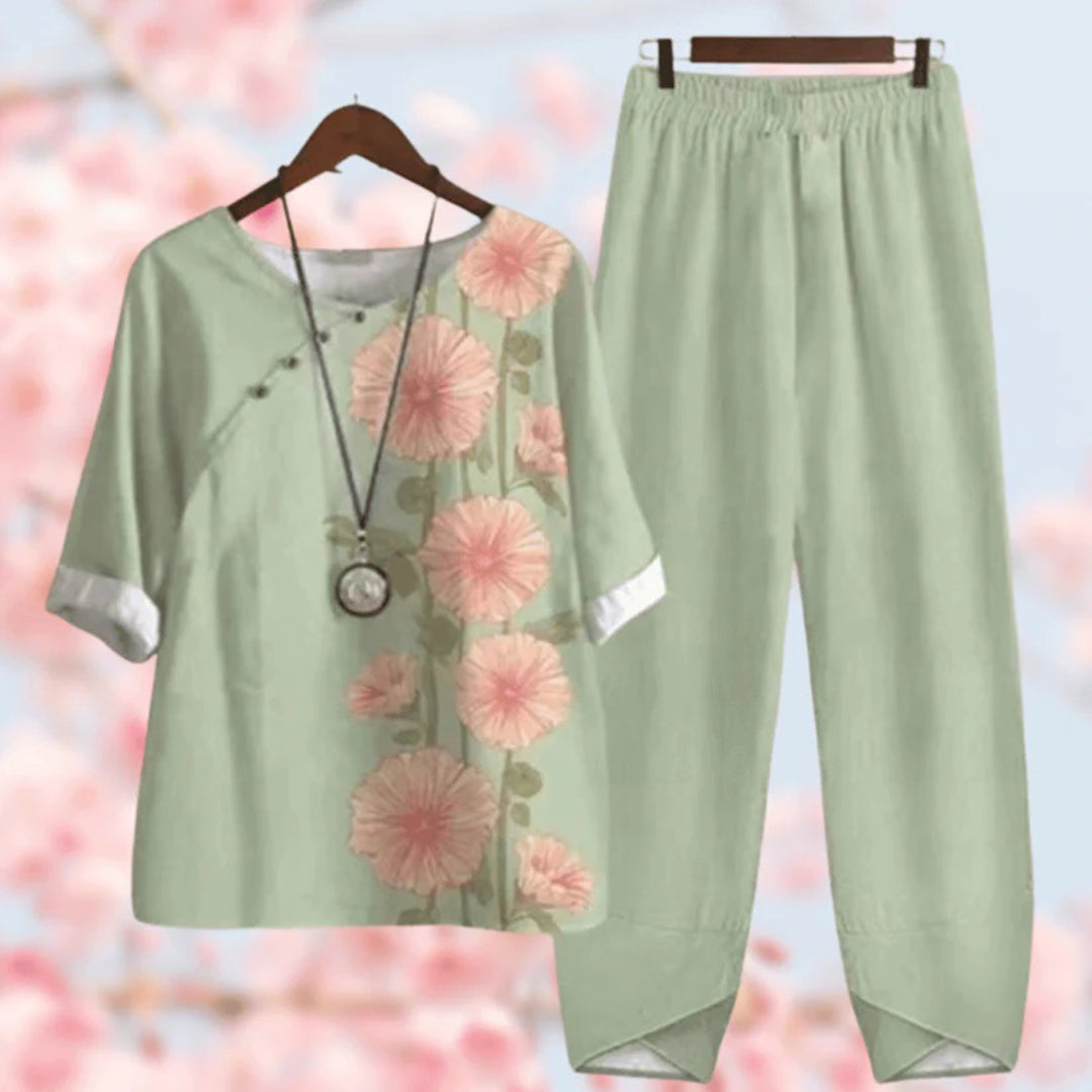 Women's floral button-detail top and wide-leg elastic waist pants set, three-quarter sleeves