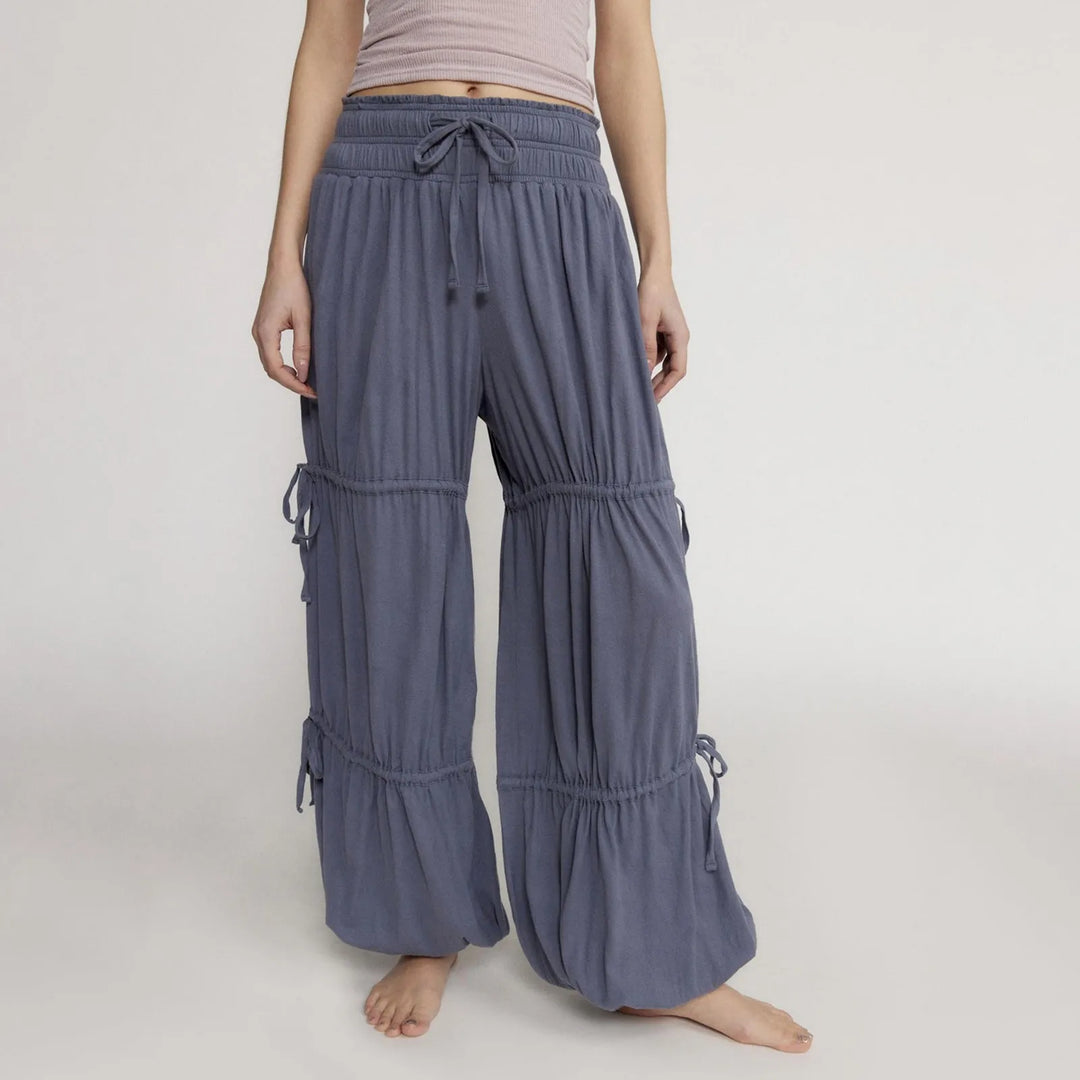 Wide-leg ruched pants with drawstring gathers, lightweight breathable fabric for all-day travel comfort