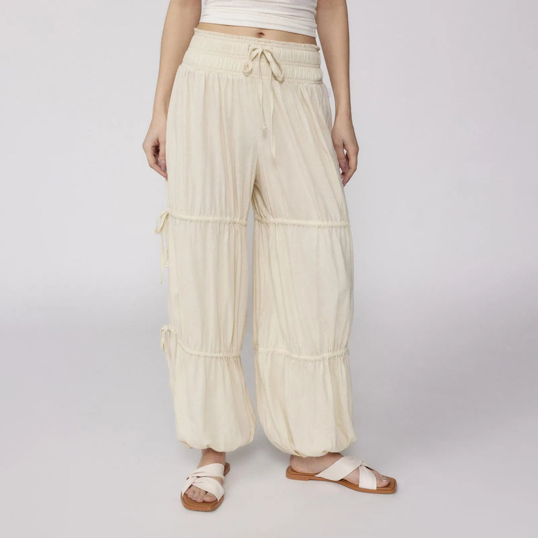 Wide-leg travel pants with ruched waistband and drawstring gathered ankles for effortless boho comfort