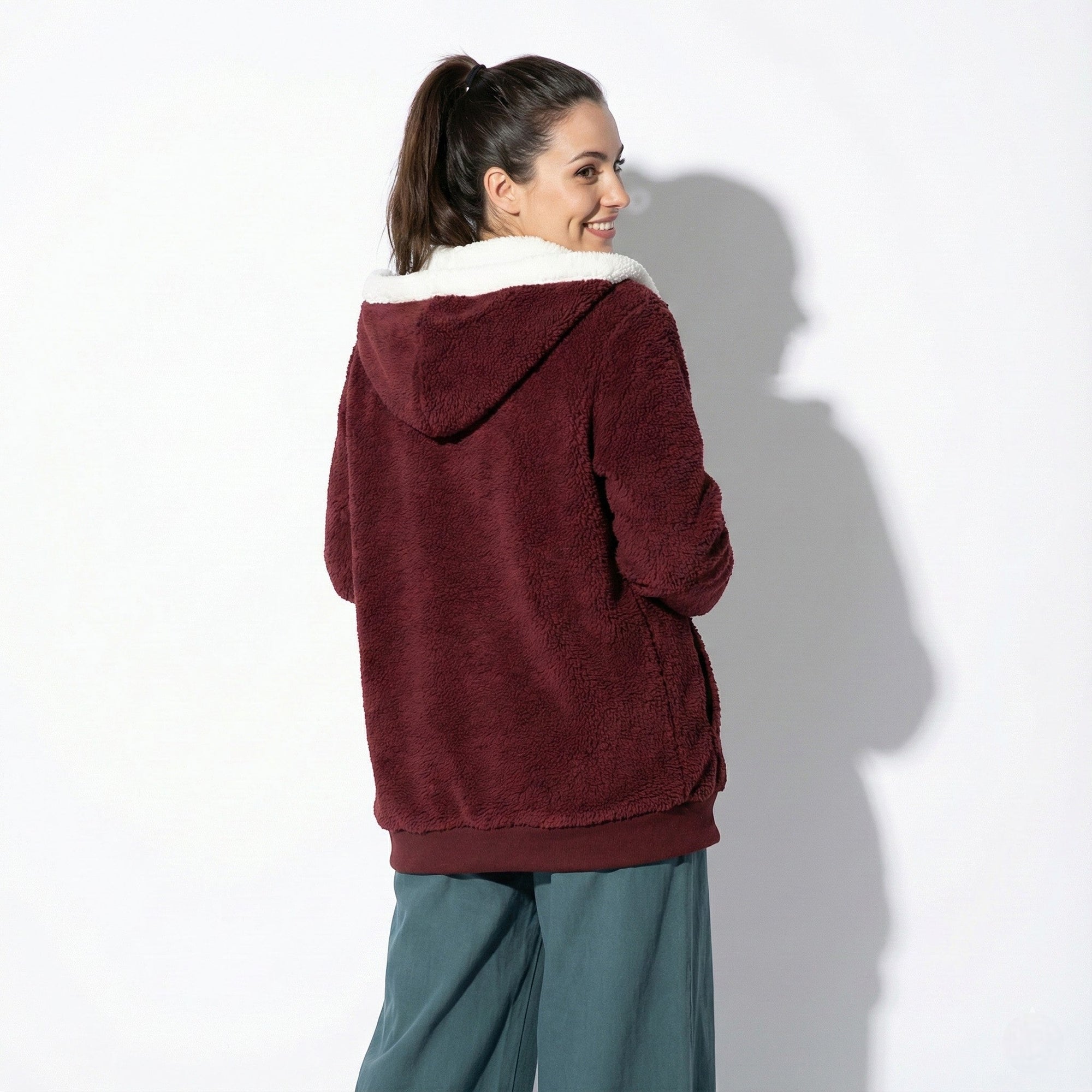 Women's oversized zip-up hoodie with drawstring hood, cozy sherpa-lined casual layer