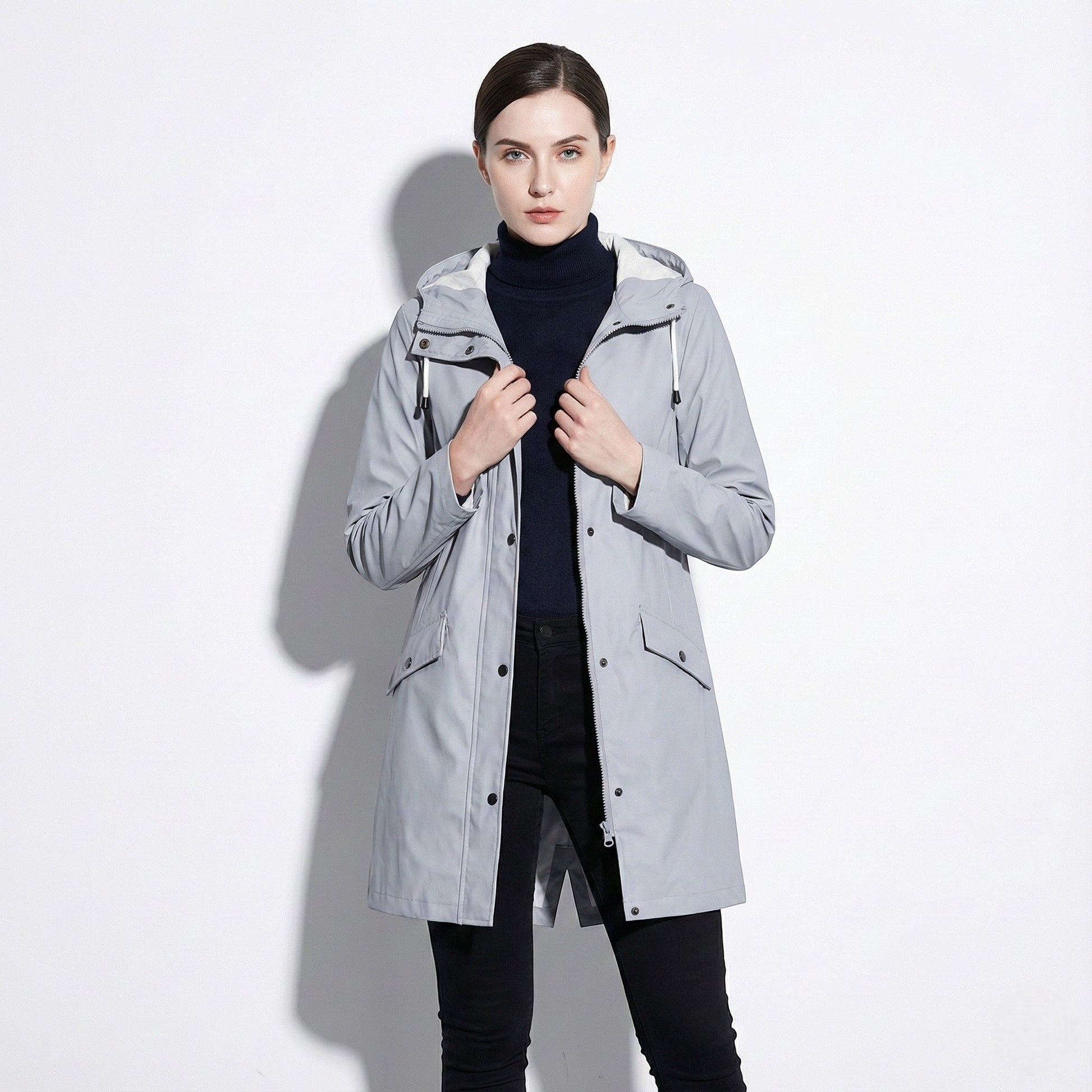 Women's mid-length water-repellent jacket with drawstring hood, sleek urban silhouette for professionals