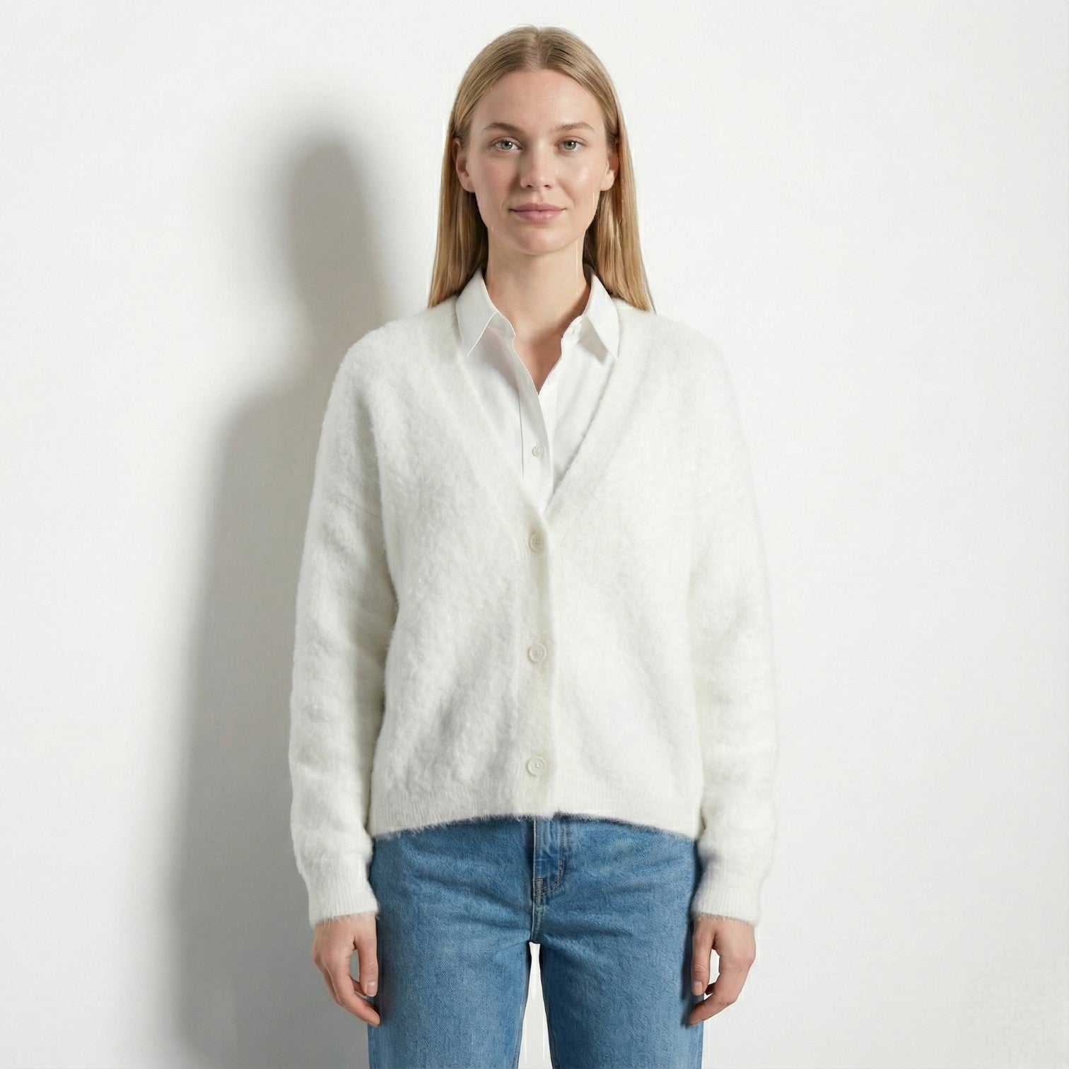 Women's oversized fuzzy knit cardigan in neutral tone, relaxed silhouette with elegant front button placket