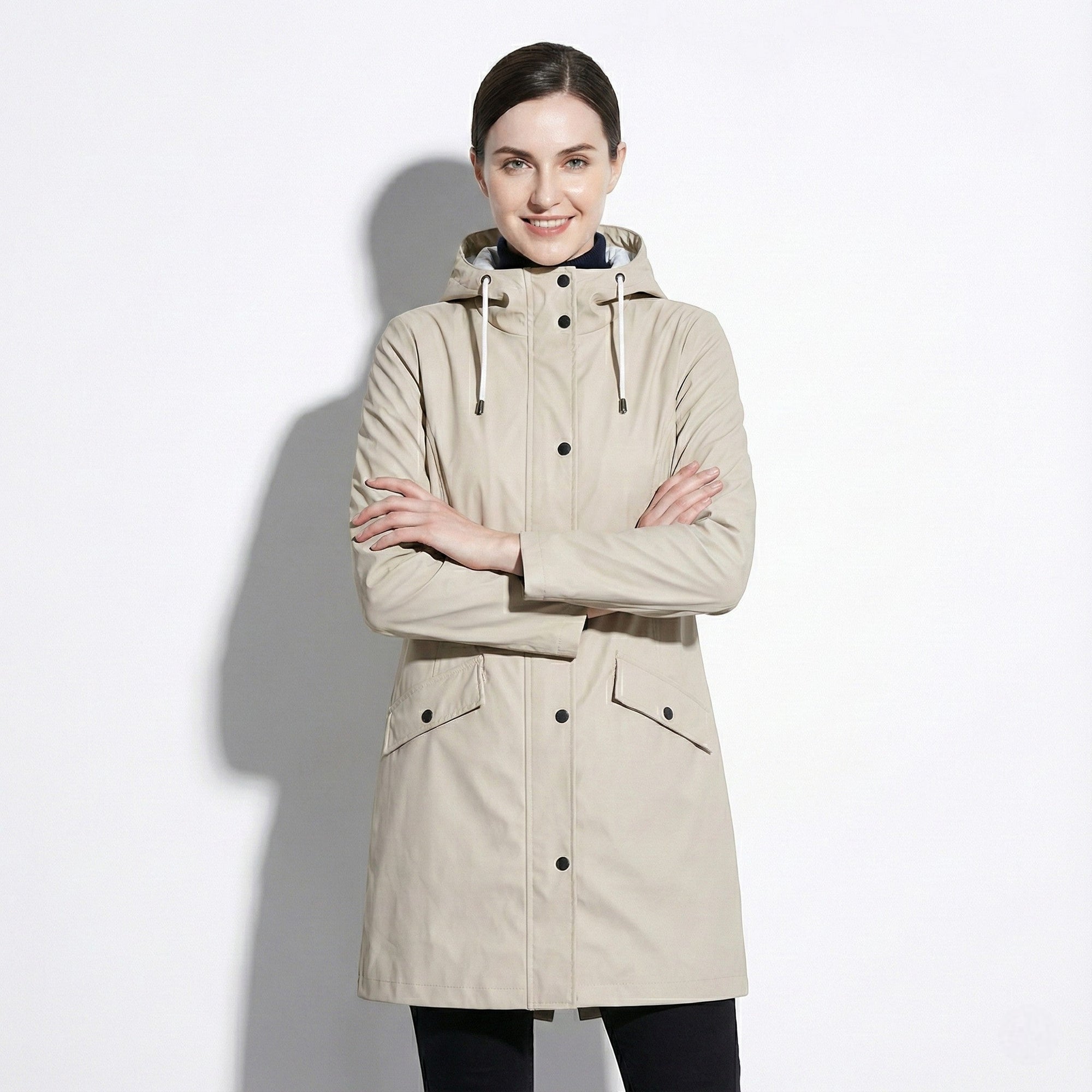 Women's mid-length water-repellent jacket with drawstring hood, sleek urban silhouette