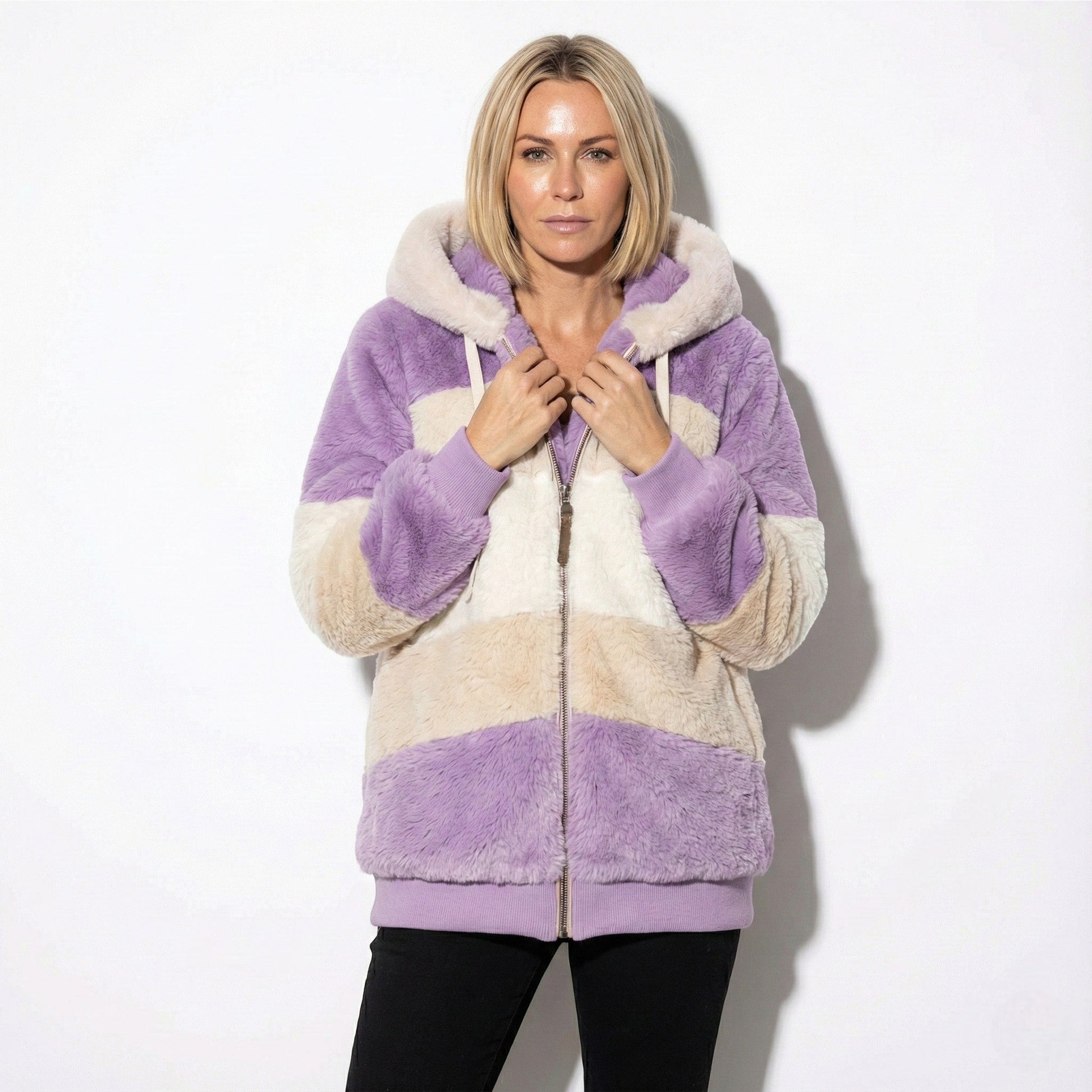 Women's oversized faux fur hooded jacket in cozy neutral tones with relaxed silhouette for effortless layering
