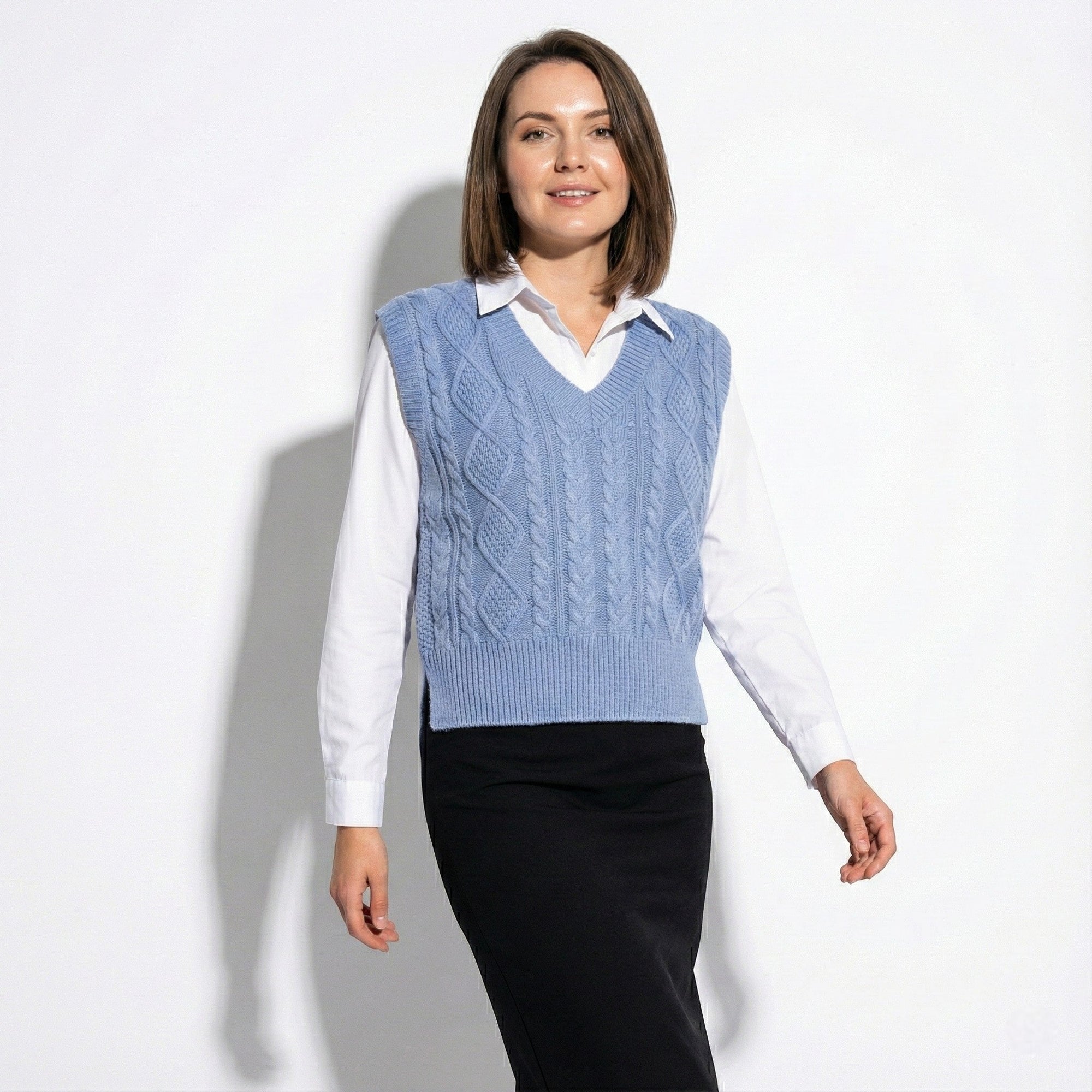 Women's cream cable knit sweater vest, V-neck vintage-style layering piece with classic textured detail