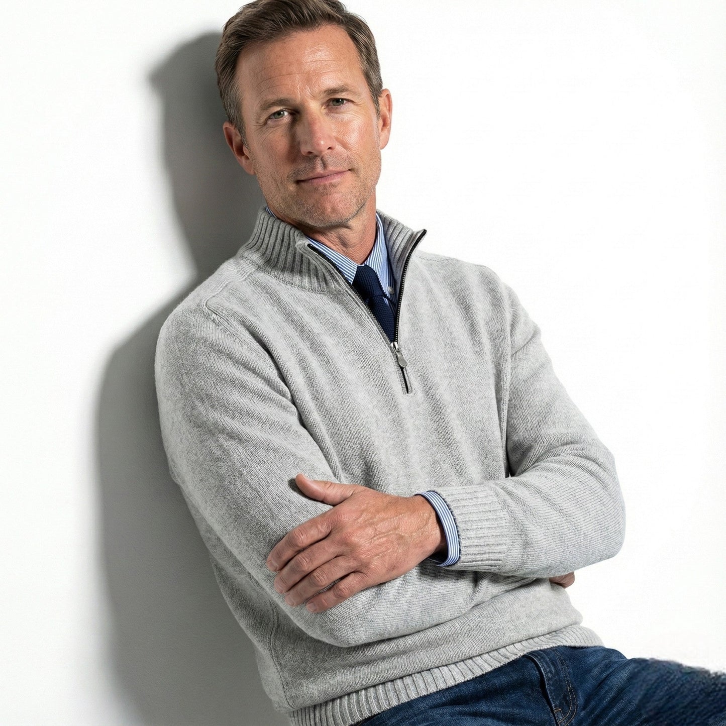 Men's navy quarter-zip mock neck sweater with ribbed cuffs, smart casual knit for layering