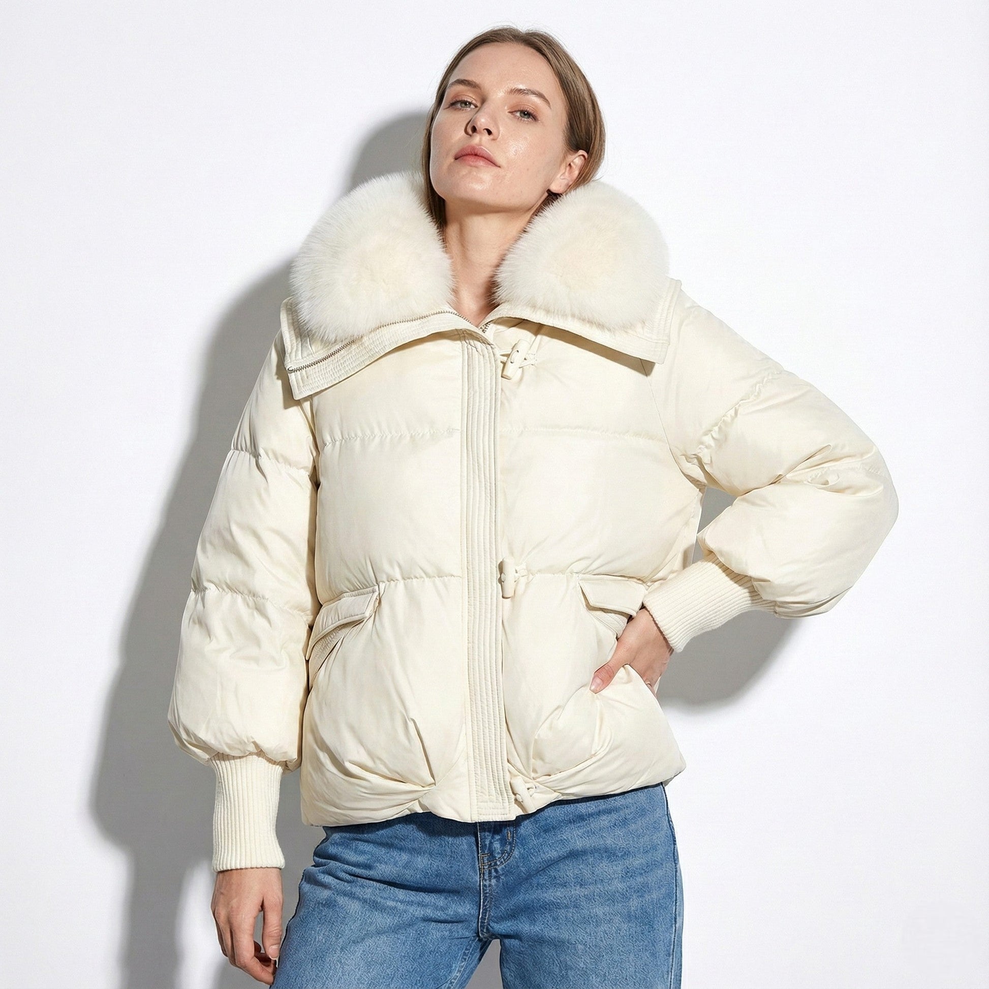 Women's oversized black puffer jacket with plush fur collar, cozy winter style for flattering fit