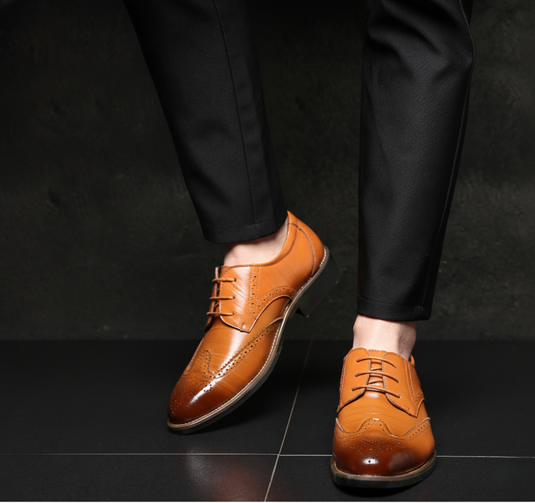 Men's brown wingtip brogue lace-up leather dress shoes with stacked heel and classic perforated detailing