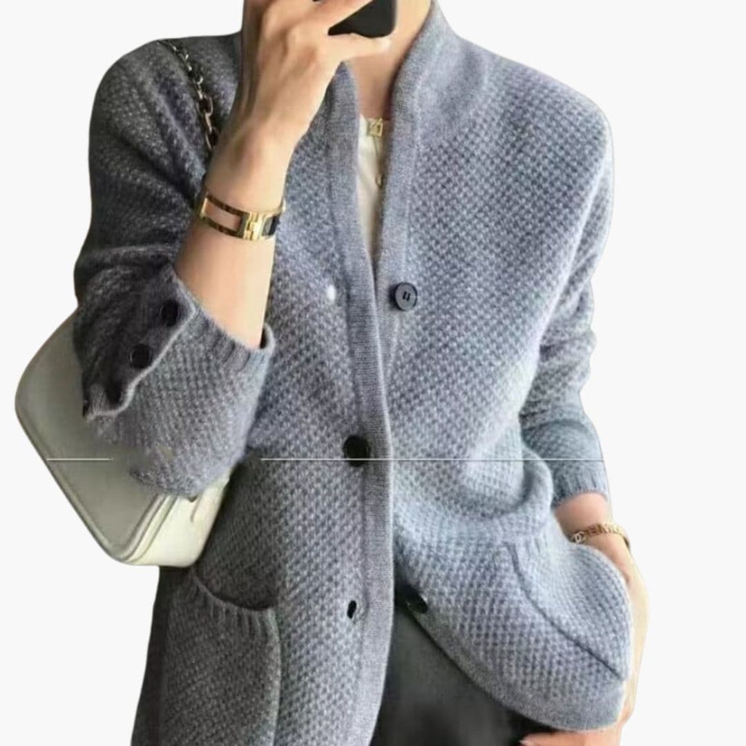 Women's textured knit cardigan with button front, ribbed neckline, side pockets, cozy versatile style
