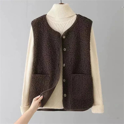 Women's faux shearling sleeveless vest cozy lightweight layer for autumn winter fashion styling