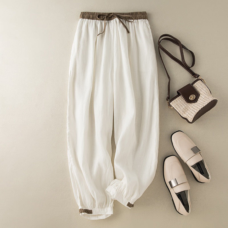 Women's beige linen pants relaxed fit adjustable waist and cuffs lightweight breathable everyday wear