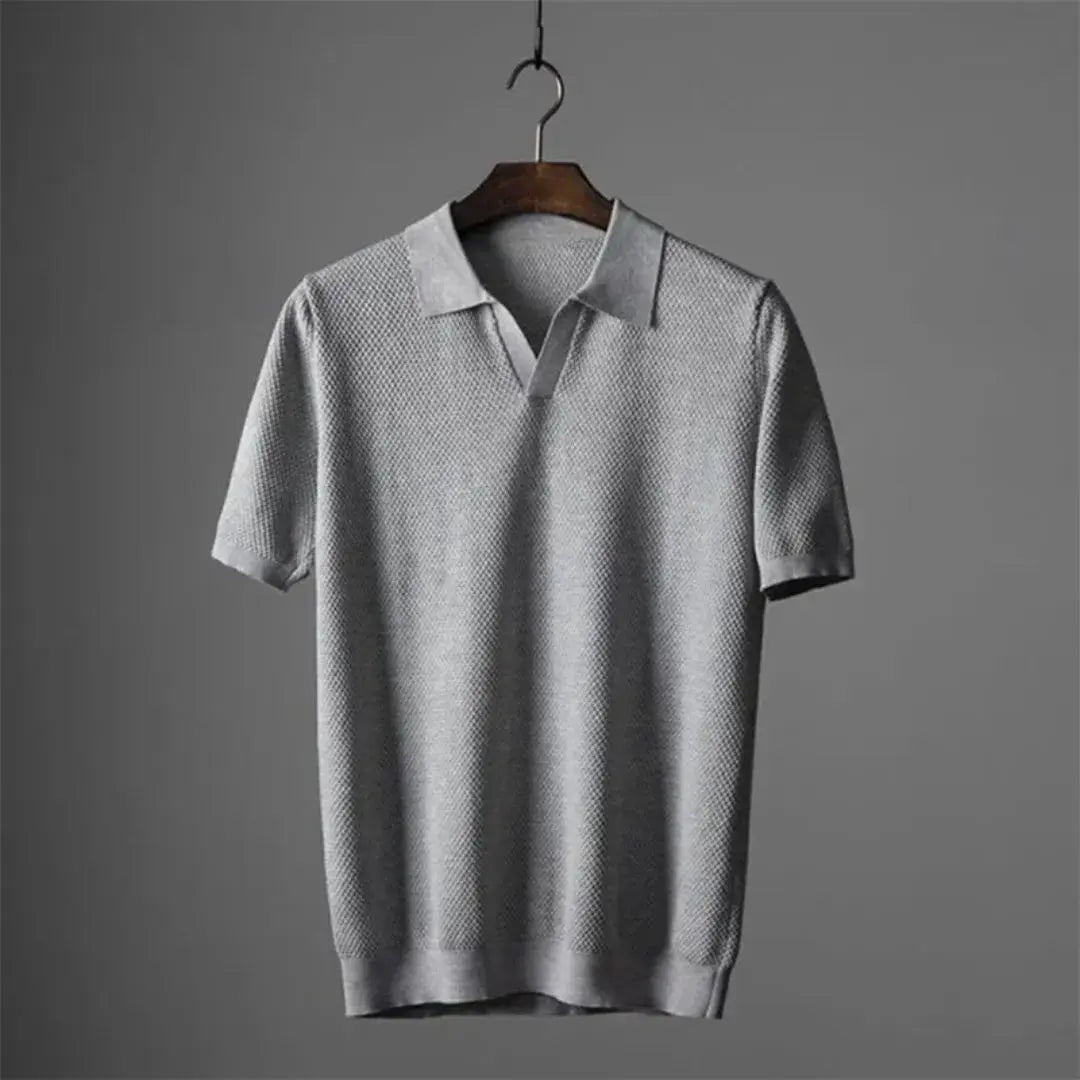 Men's white premium Peruvian cotton polo shirt with elegant waffle collar and slight stretch