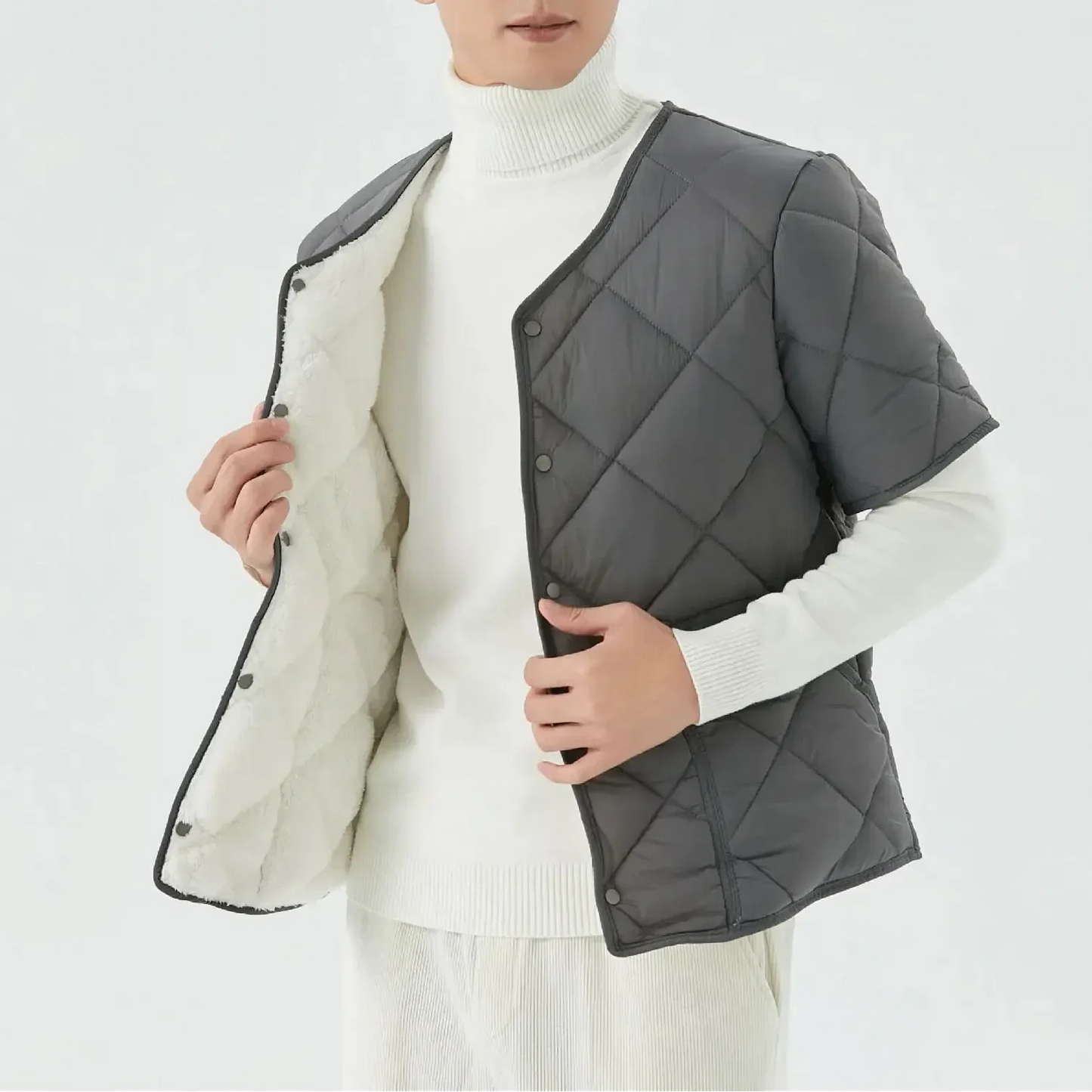 Unisex quilted vest with cozy fleece lining, lightweight layering essential for all-season versatile warmth