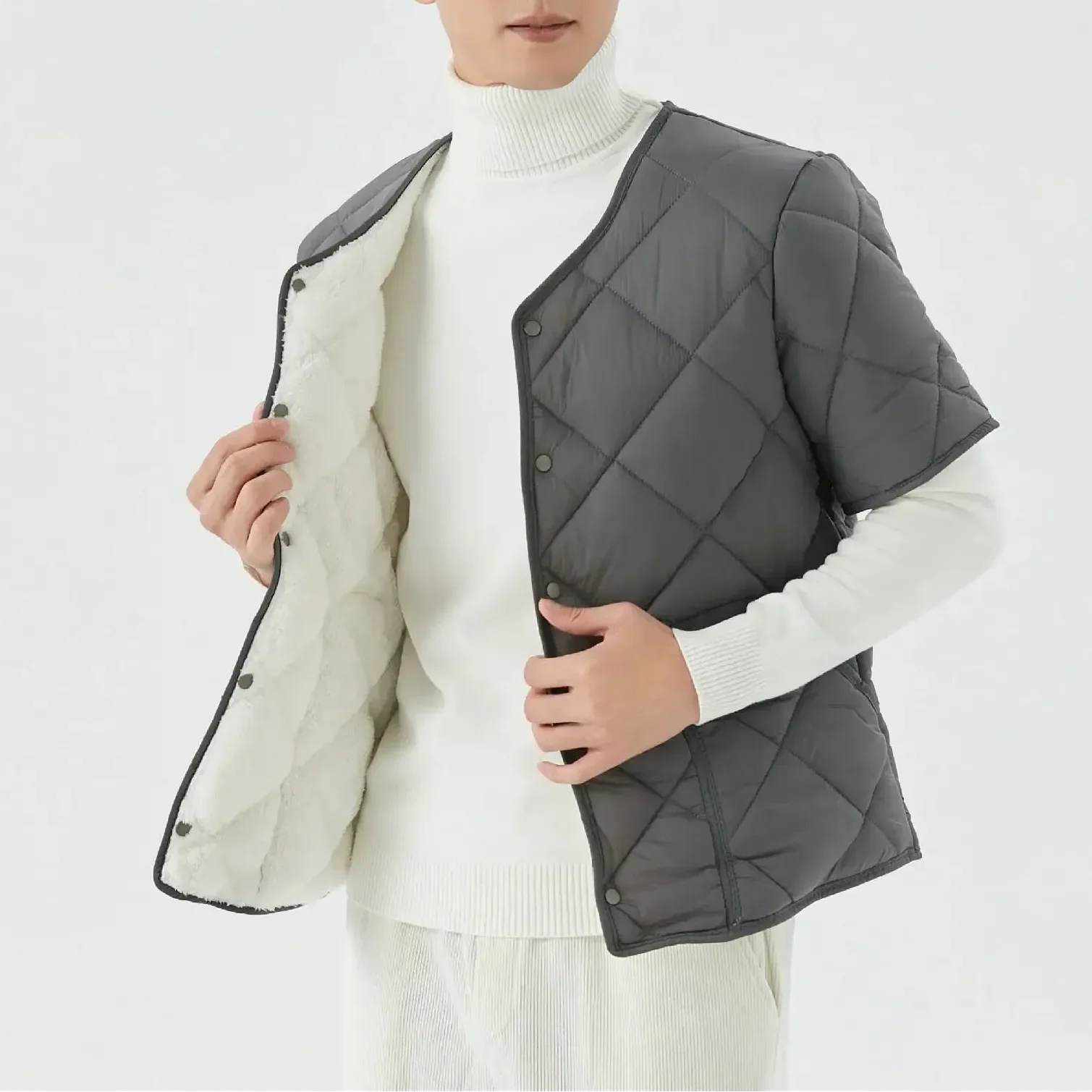 Unisex quilted vest with cozy fleece lining, lightweight layering essential for all-season versatile warmth