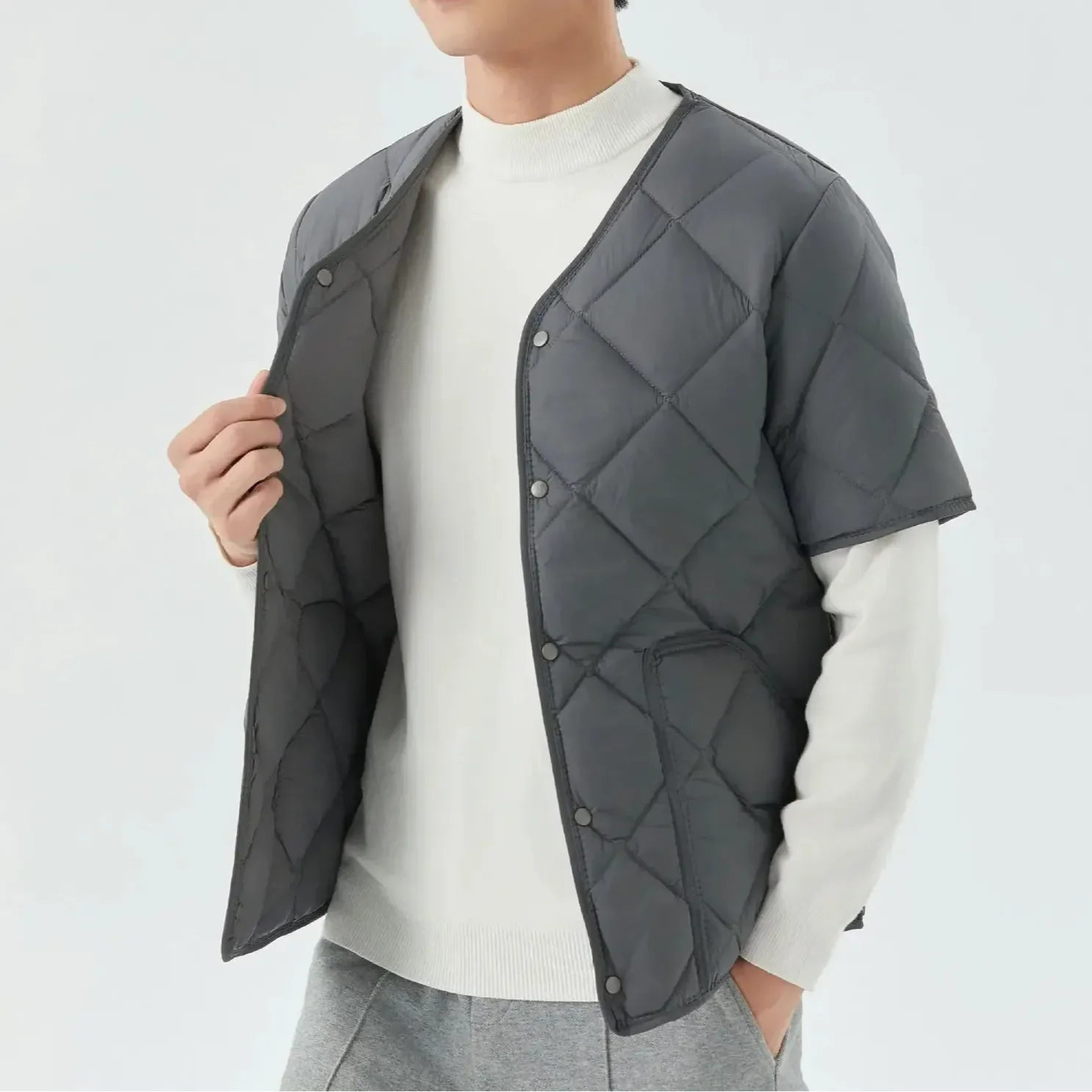 Unisex quilted vest with cozy fleece lining, lightweight structured shell, versatile layering essential