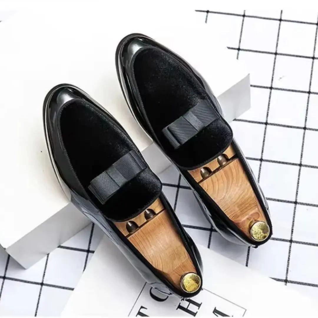 Black dress loafers with elite cushioned footbed and refined ribbon vamp detail for gentlemen