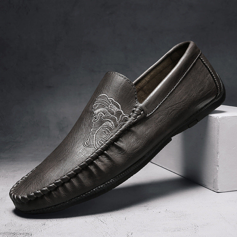Men's brown full-grain leather loafers hand-stitched slip-on with signature embroidered motif