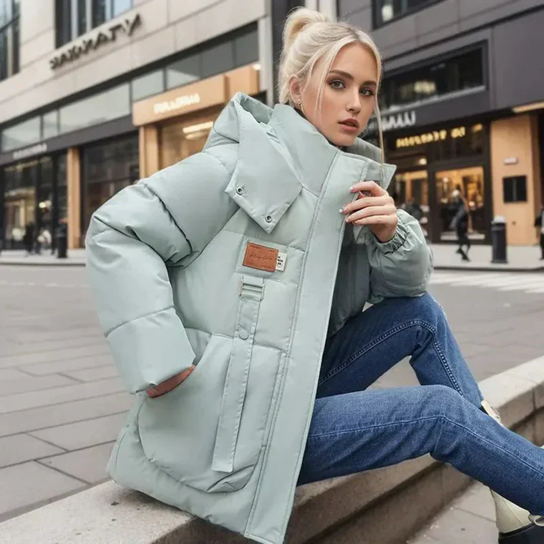 Women's Reika winter snow jacket water-repellent shell premium warmth all-weather protection