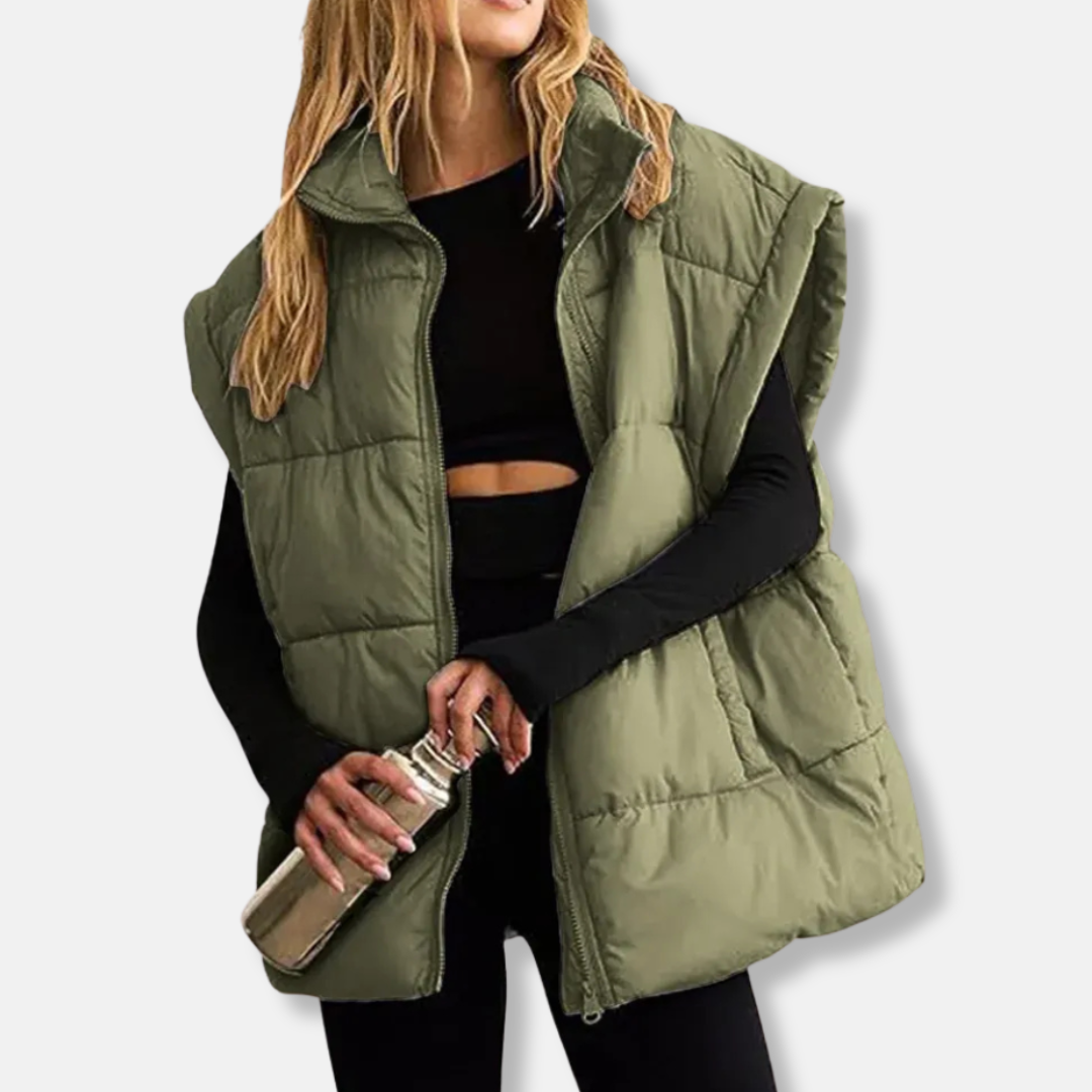Women's quilted puffer vest stand collar hip-length warm layering essential in versatile fall style
