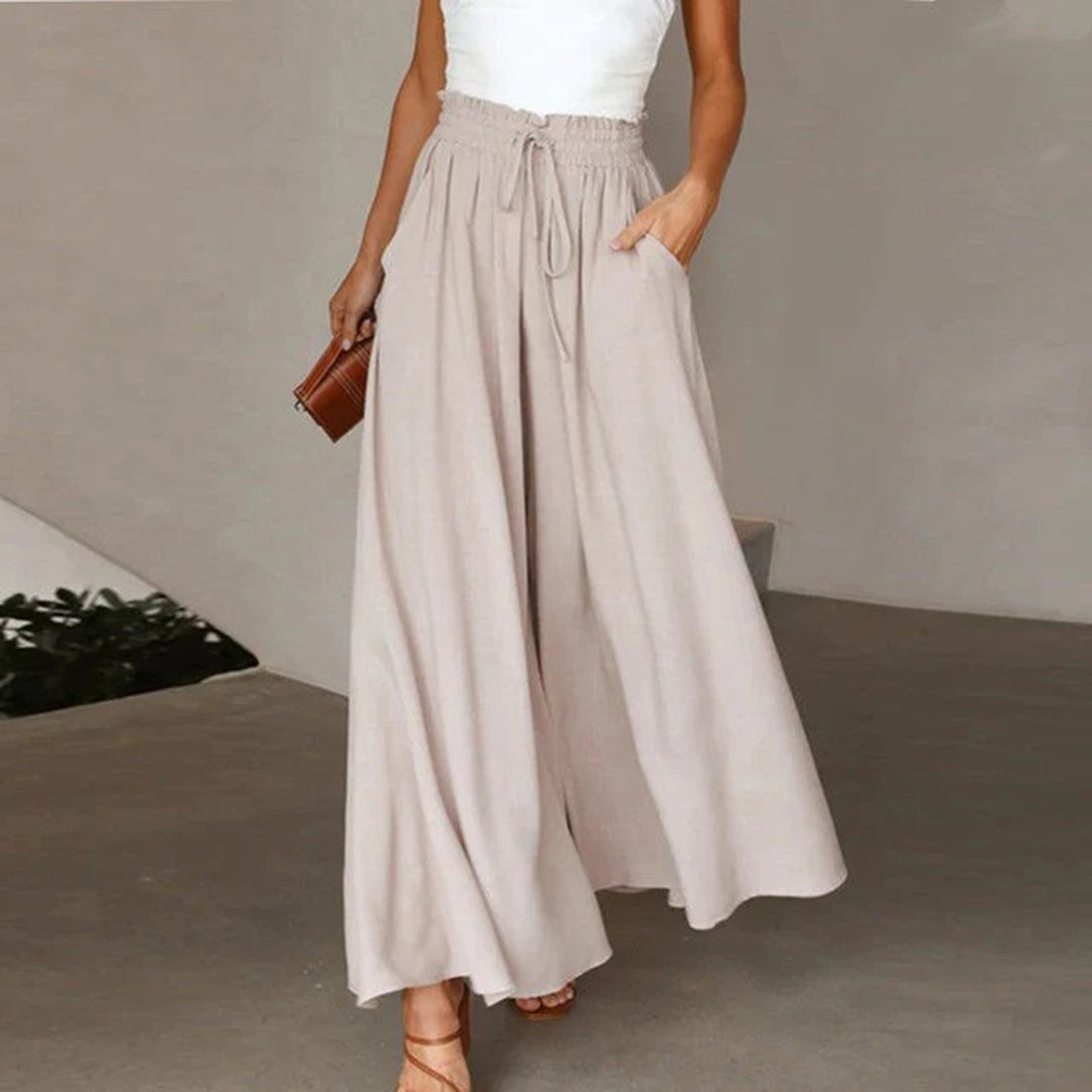 Women's lightweight high-waist drawstring trousers in neutral tones, breathable cotton blend for all-day comfort