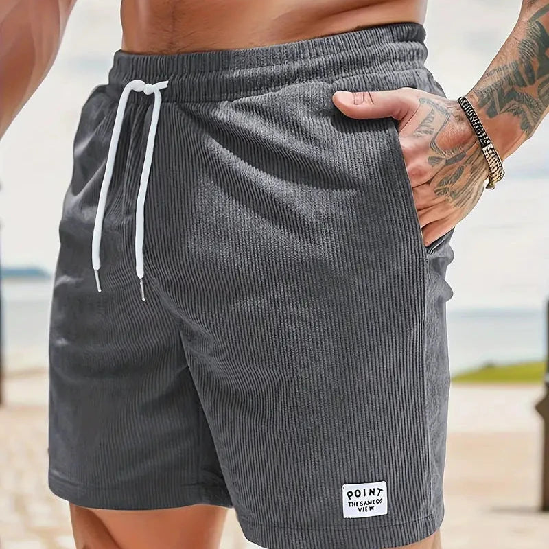 Men's beige corduroy drawstring shorts relaxed fit textured fabric casual beach everyday style