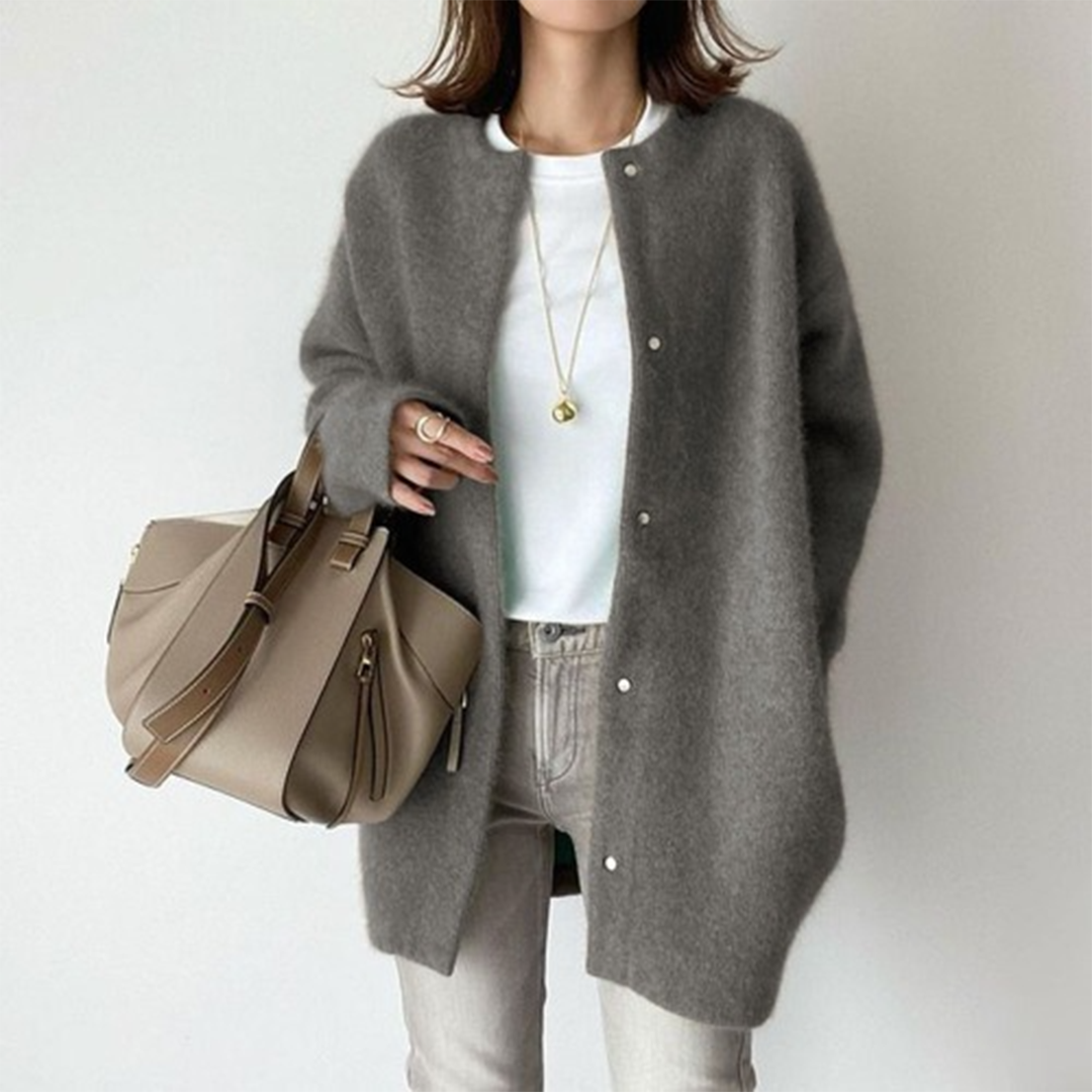Women's elegant relaxed fit winter cardigan cozy oversized silhouette with subtle button-down closure