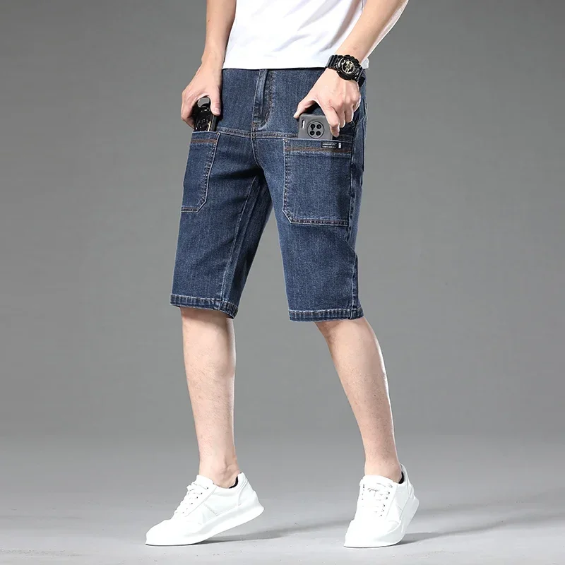 Men's blue utility denim cargo shorts above-knee cut with oversized front pockets for active wear