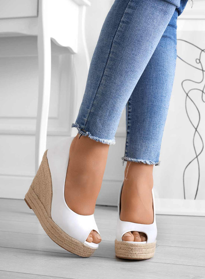 Women's suede wedge slip-on sandals in neutral tone, elegant silhouette with all-day comfort design