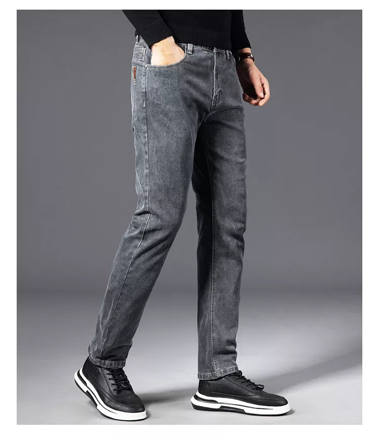 Men's slim fit stretch denim jeans in classic blue, tailored silhouette with all-day flexible comfort