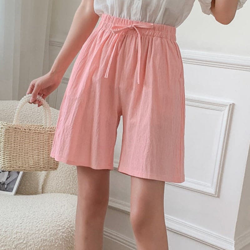 Women's knee-length relaxed fit cotton blend shorts with elastic drawstring waist in casual style