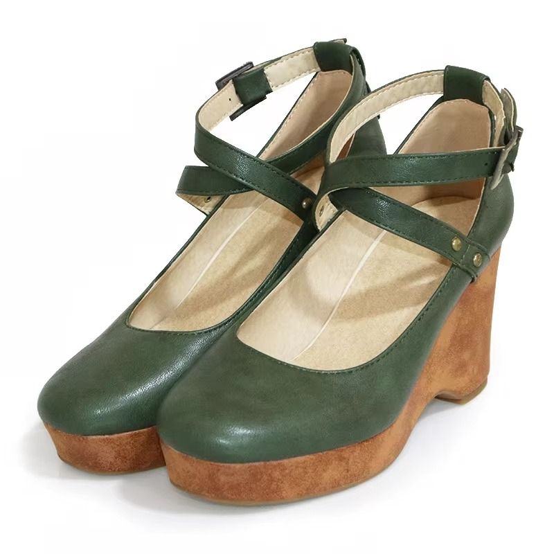 Brown chunky platform Mary Jane heels with buckle strap and gothic-inspired block heel design
