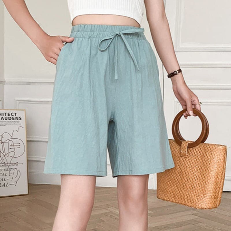 Women's knee-length relaxed fit cotton blend shorts with elastic drawstring waist, casual everyday style