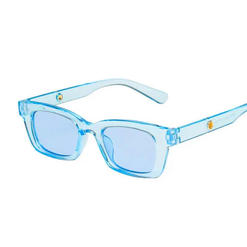 Bold black rectangular wayfarer sunglasses with dark lenses and gold-tone temple accents
