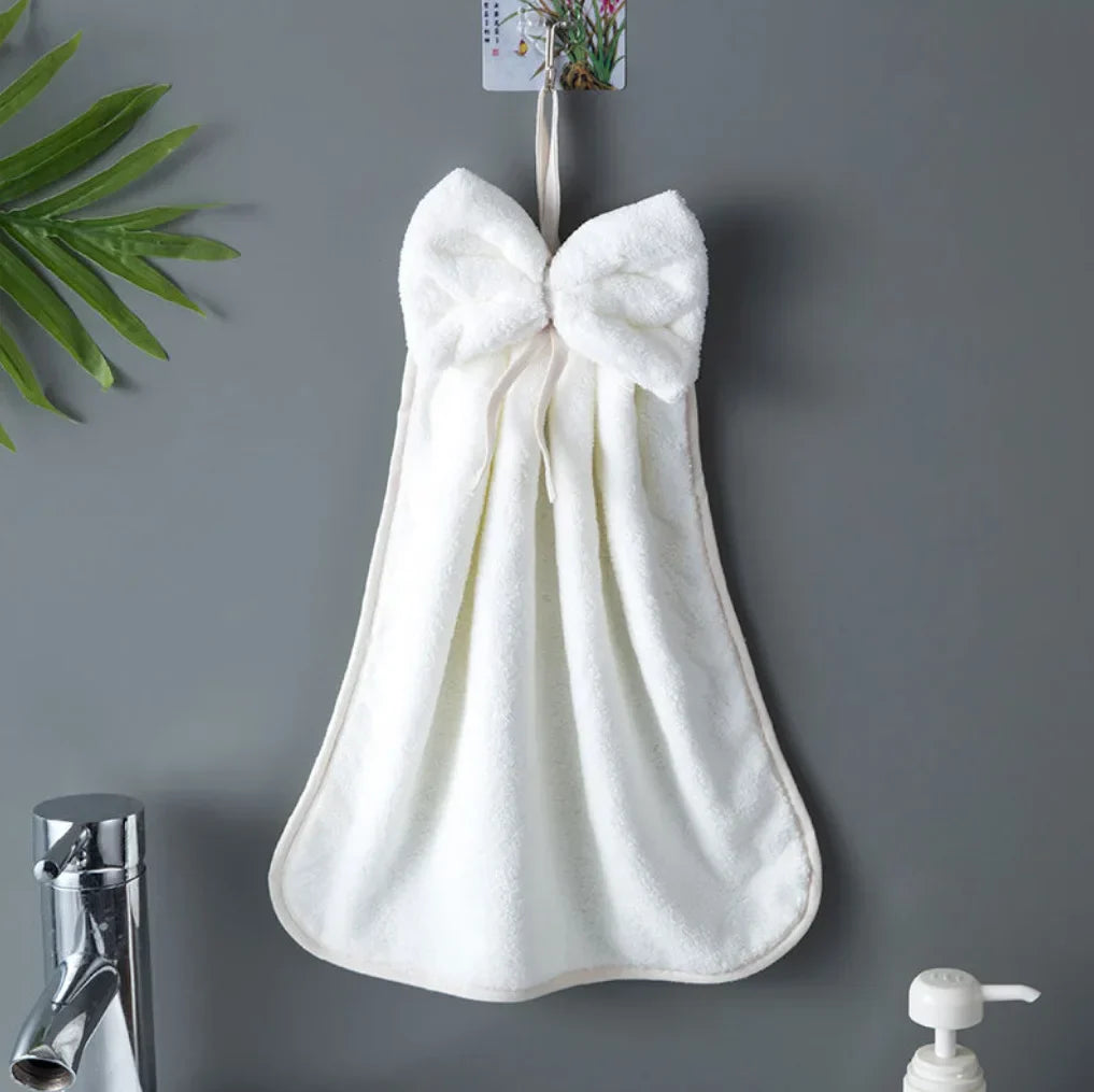 Coral velvet microfiber towel with bow charm accent, ultra-soft quick-dry design for kitchen and bath