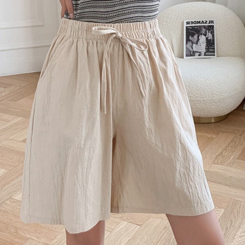 Women's relaxed fit knee-length shorts in natural fiber blend with elastic waist for all-day comfort