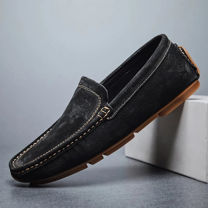 Men's brown genuine leather slip-on loafers with hand-stitched detailing and lightweight sole