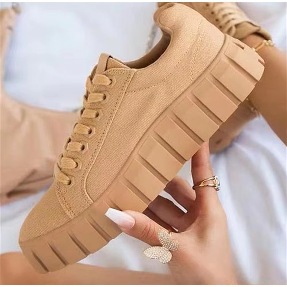 Women's high platform walking shoes in bold streetwear style with elevated sole for everyday comfort