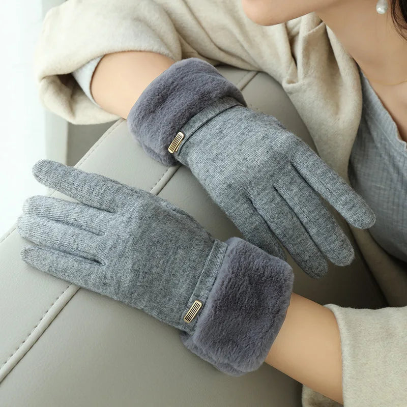 Women's black fitted wrist-length gloves with faux fur cuff and strap detail for winter