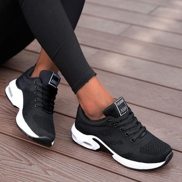 Women's athletic running shoes bold sporty accents lightweight support city-ready style everyday comfort