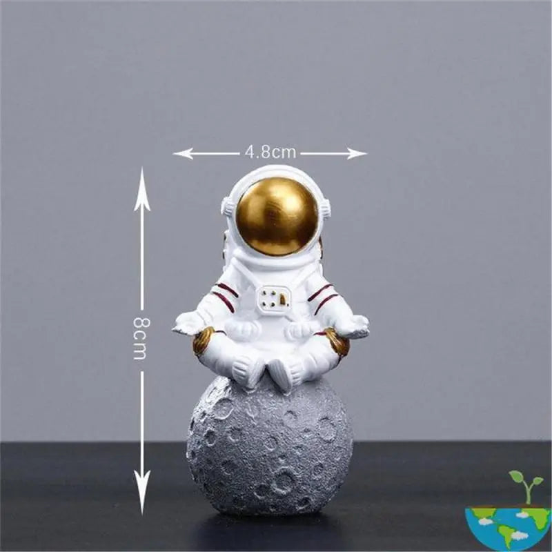 Astrocom astronaut resin figurine with realistic suit helmet and gear detail for space fans